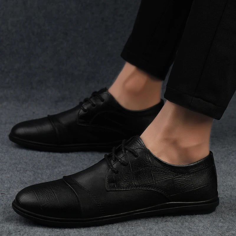 Men's dress shoes in black, combining comfort with a sleek, professional formal look.