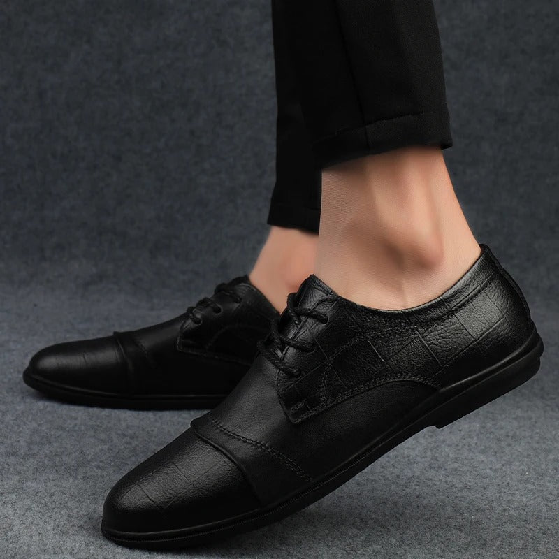 Premium black men's dress shoes offering all-day comfort for demanding office wear.