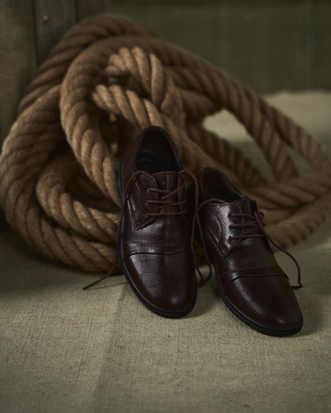 Brown men's formal dress shoes, versatile and comfortable for business and special events.