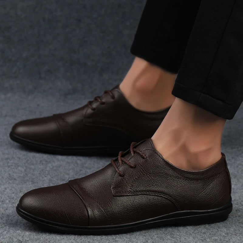 Sleek black men's comfortable dress shoes, perfect for office wear & formal occasions.