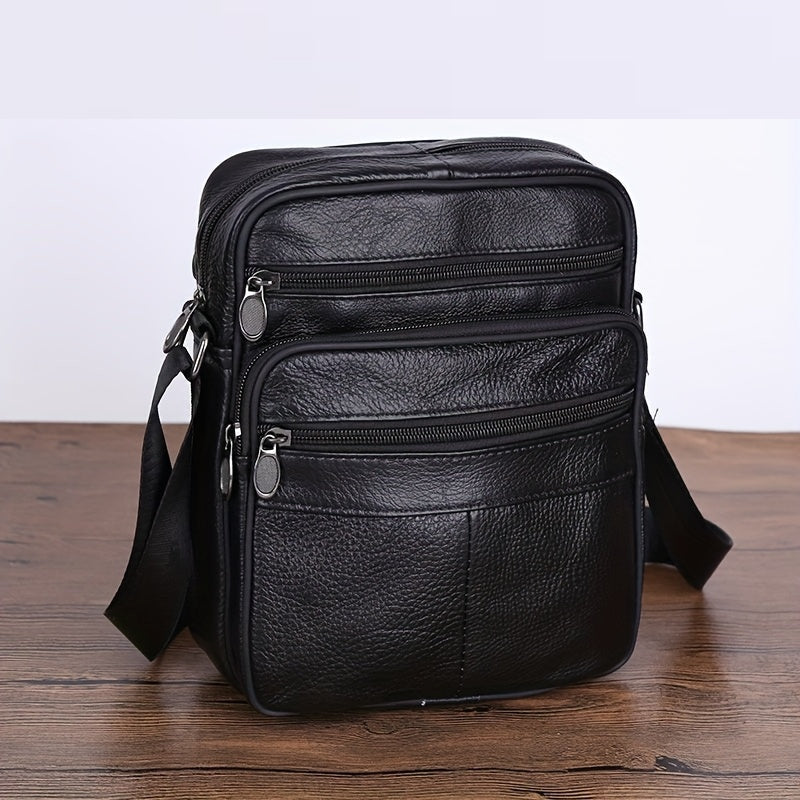 Black men's everyday shoulder bag. Spacious with an adjustable cross-body strap for work & travel.