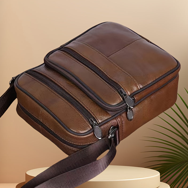 Men's black cross-body bag. Ideal for work, travel & everyday essentials. Spacious with adjustable strap.
