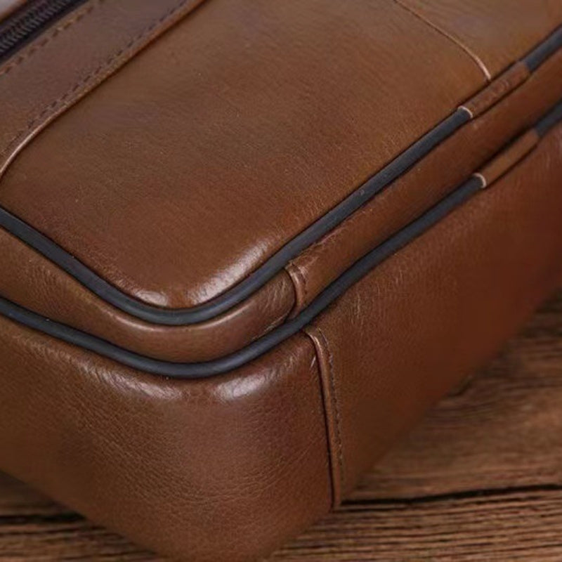 Versatile black men's shoulder bag. Everyday carry for work & travel. Adjustable cross-body strap.