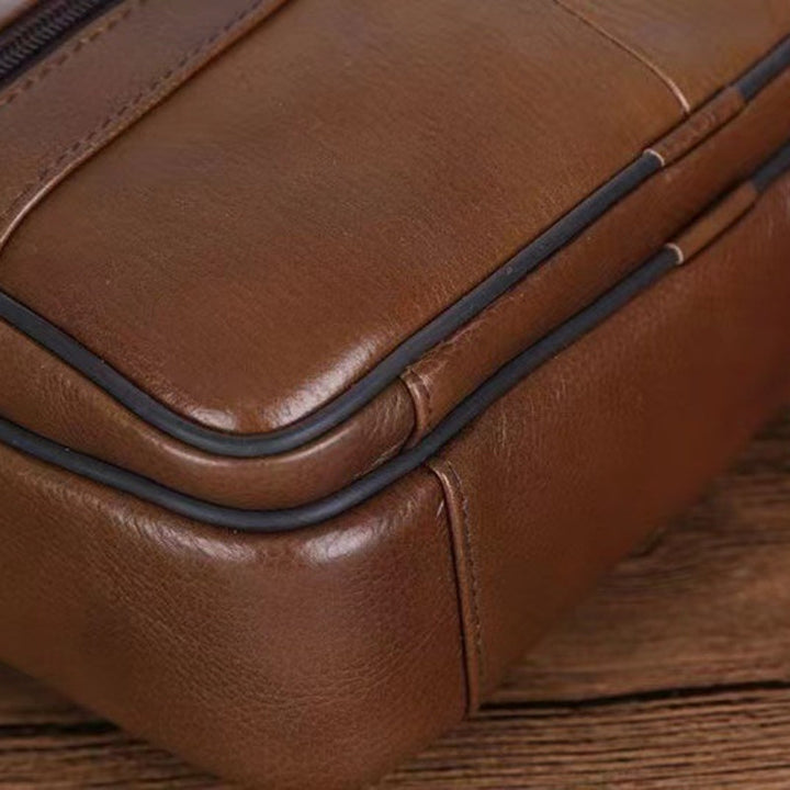 Versatile black men's shoulder bag. Everyday carry for work & travel. Adjustable cross-body strap.