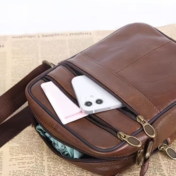 Professional men's brown bag. Organized for business meetings & daily use. Adjustable shoulder strap.