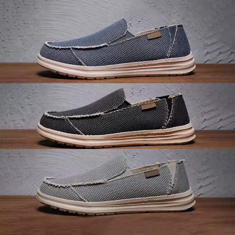 Black men's lightweight comfort slip-on loafers. Ideal for casual everyday walking & versatile style.