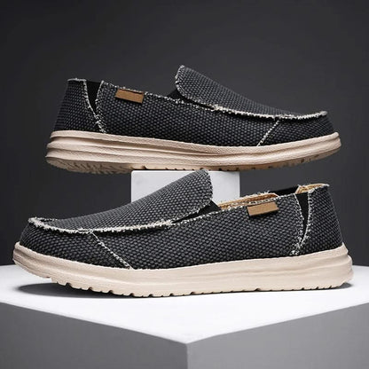 Blue men's casual slip-on loafers, lightweight and comfortable for everyday wear. Durable classic footwear.