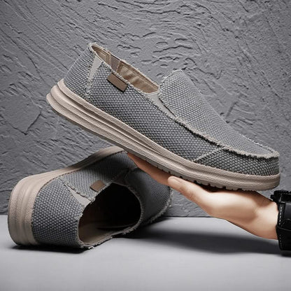 Versatile black men's slip-on loafers. Lightweight comfort footwear, ideal for casual everyday walking.