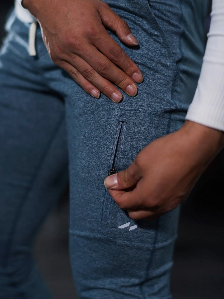 Tapered fit men's joggers, black, great for travel, offering style & freedom.