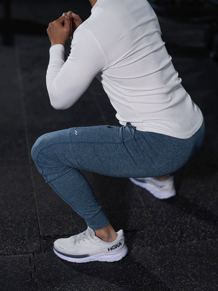Olive green men's casual stretch joggers, styled for everyday comfort.