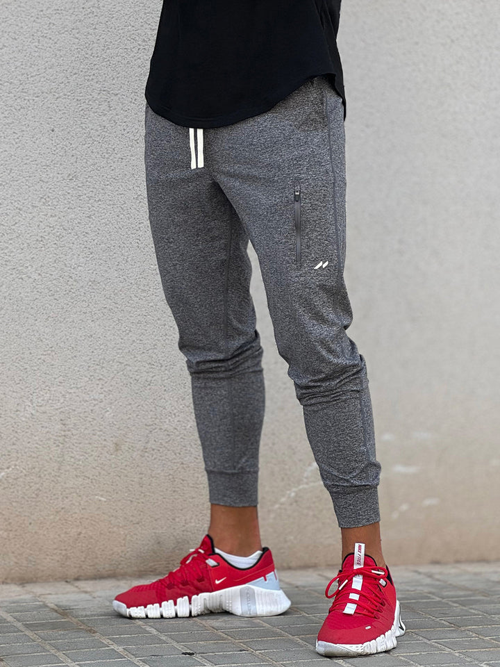 Comfortable black men's tapered fit joggers, for lounging or quick errands.