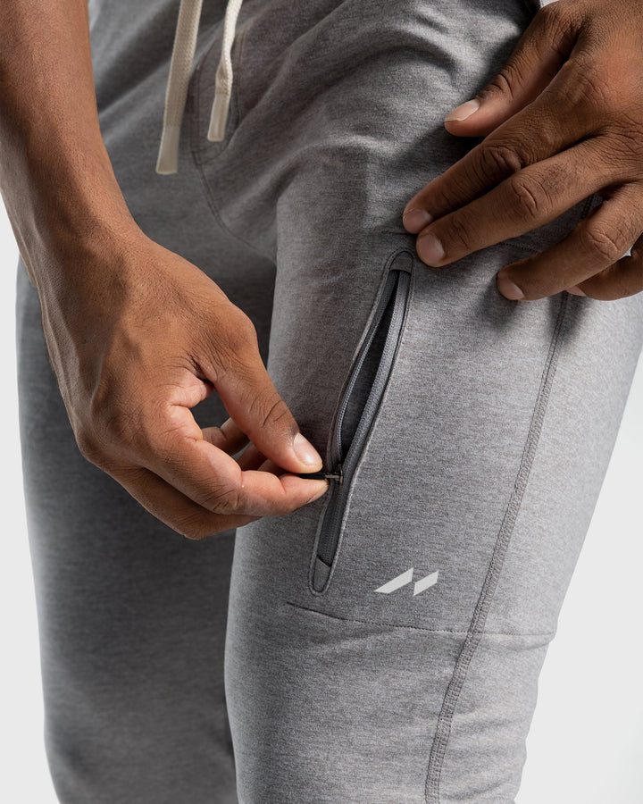 Men's activewear joggers, navy blue, durable for outdoor sports & activities.