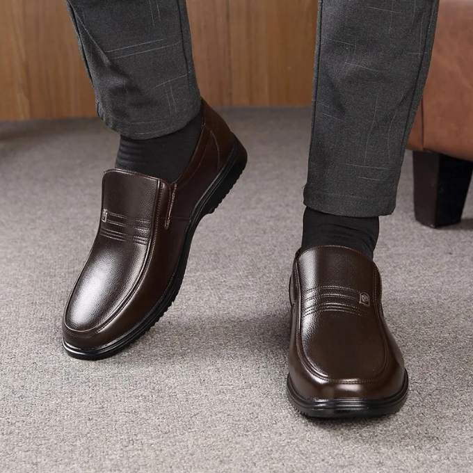Men's classic dark brown business loafers, comfortable slip-on dress shoes for formal events and office wear.
