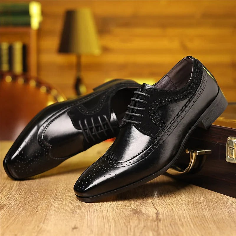 Men's Regent Brogue Oxford dress shoes in black, perfectly paired with a professional suit for formal occasions.