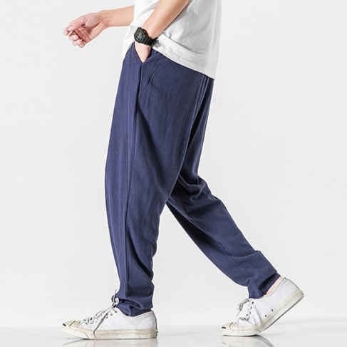 Black men's everyday wear pants, relaxed fit, casual style with comfortable drawstring waist.
