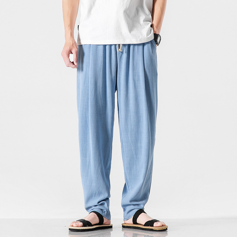 Beige relaxed fit men's summer pants, ideal for comfortable casual and everyday wear.