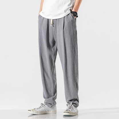 Navy blue relaxed fit men's casual pants, offering effortless style and everyday comfort.
