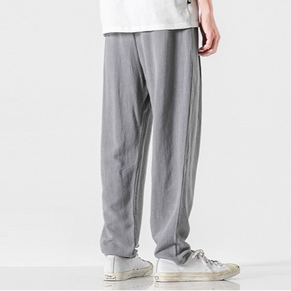 Men's relaxed fit casual pants in black, ideal for comfortable everyday wear and modern fashion.