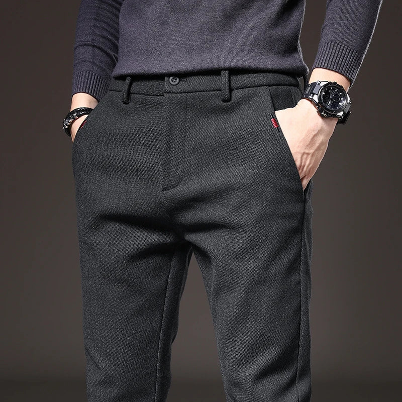 Black men's slim fit stretch dress pants, tailored for modern office wear.