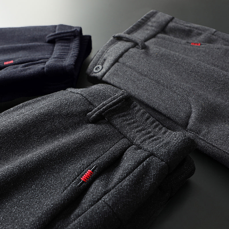 Men's black slim fit stretch pants, designed for a tailored, modern look.