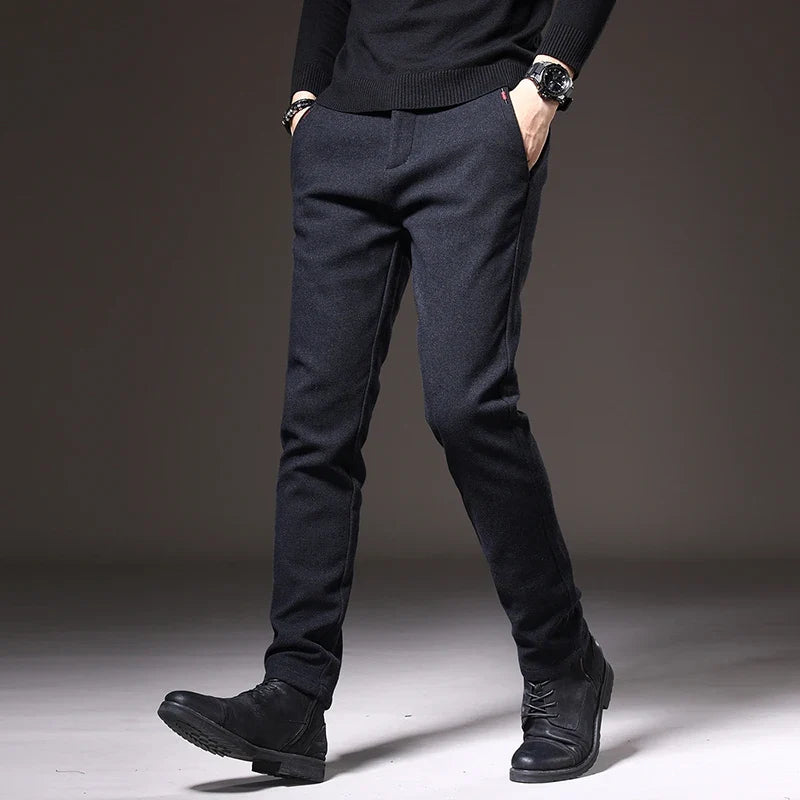 Blue slim fit dress pants with stretch, suitable for business and smart casual.