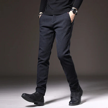 Blue slim fit dress pants with stretch, suitable for business and smart casual.