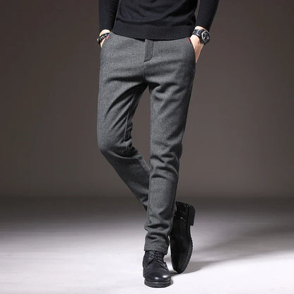 Gray men's wrinkle resistant stretch pants, tailored slim fit, office appropriate.