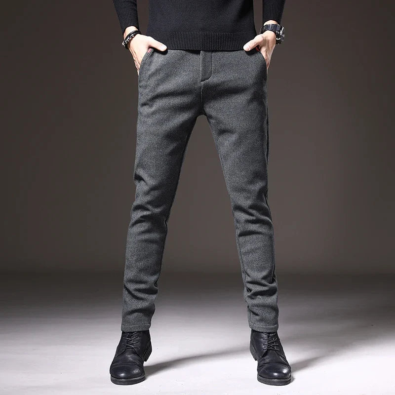 Gray slim fit stretch dress pants, wrinkle resistant, perfect for travel or office.