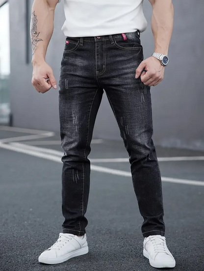 Blue men's Savage Cut tapered jeans, comfortable & versatile for casual everyday wear.