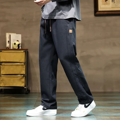 Comfortable men's relaxed drawstring pants. Adjustable waist, perfect for versatile casual & lounge wear.