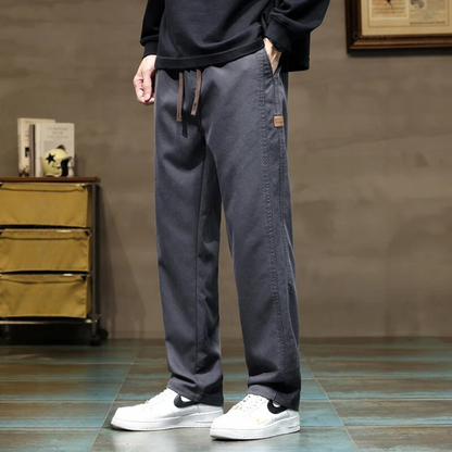 Men's stylish black drawstring pants, relaxed fit. Ultimate comfort & adjustable waist for men's fashion.