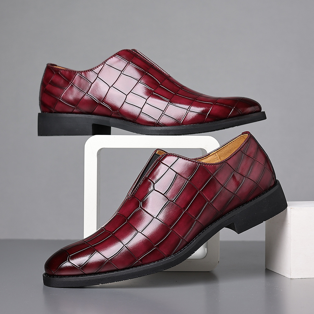 Red men's dress shoes with a polished finish, ideal for a bold formal fashion statement.