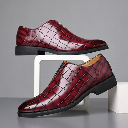 Red men's dress shoes with a polished finish, ideal for a bold formal fashion statement.