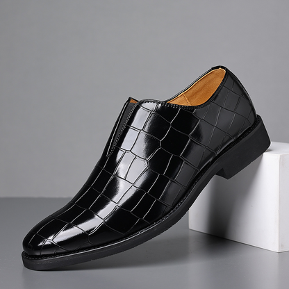 Premium brown men's dress shoes, polished & comfortable for professional business attire.