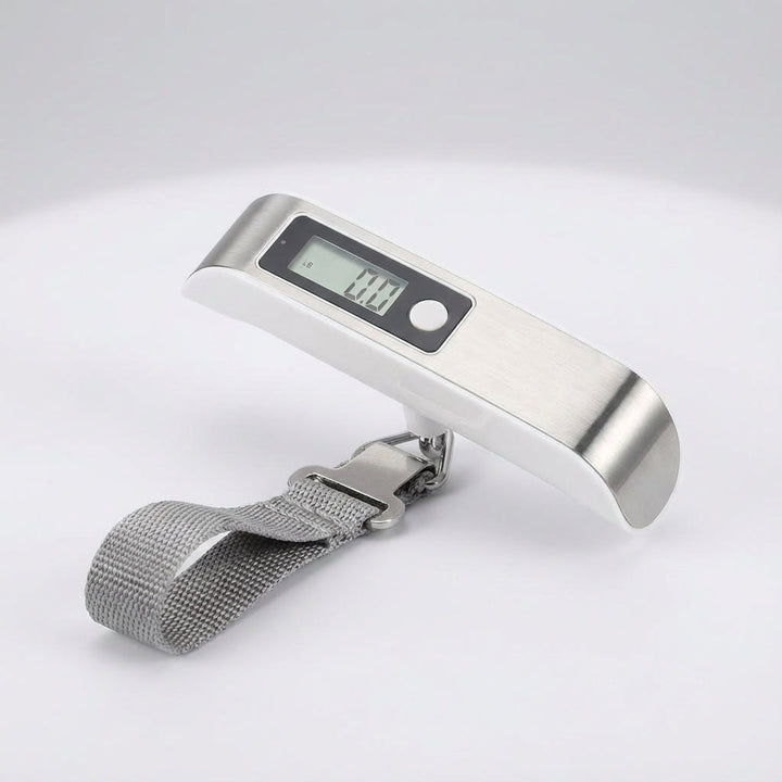 The black TravelWeigh digital luggage scale, a compact and accurate handheld device for all travelers.