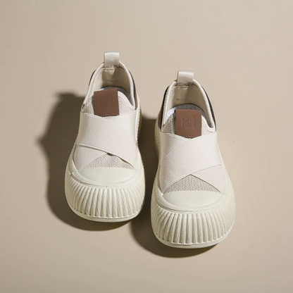 Women's Seraphine platform loafers in black & white. Comfortable, trendy slip-on footwear for modern style.