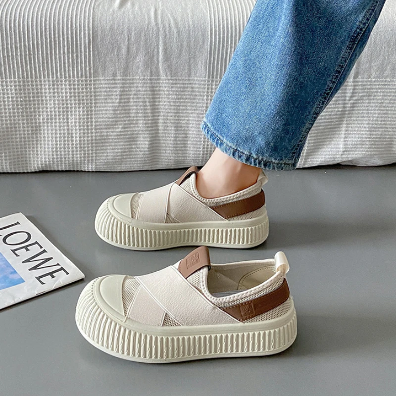 Detail of the modern platform sole on women's black Seraphine loafers. Comfortable, trendy slip-on footwear.