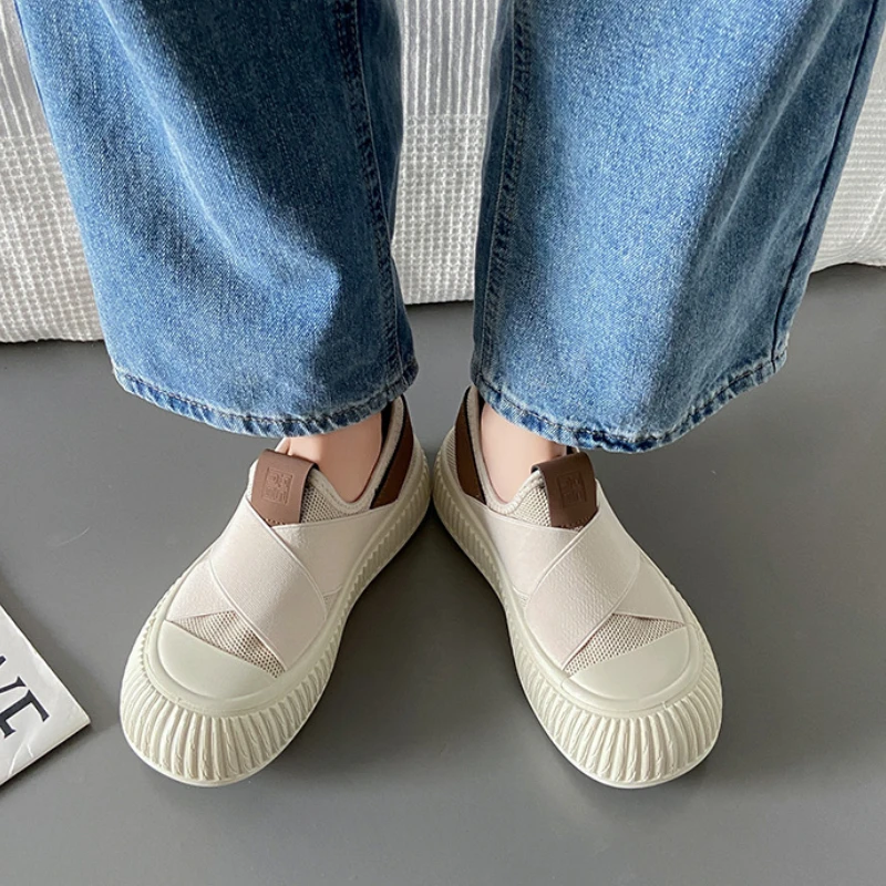 Platform heel detail of women's black Seraphine loafers. Comfortable, trendy slip-on shoes for a modern look.