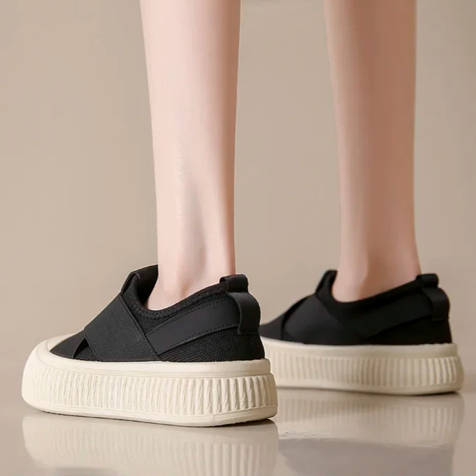 Trendy black Seraphine platform loafers for women. Modern slip-on design offers effortless style & comfort.
