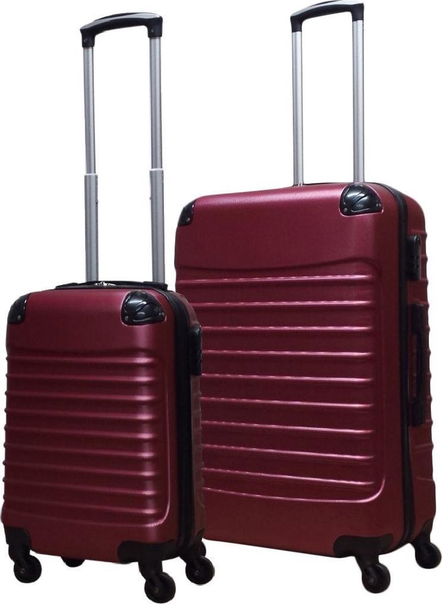 Black hardshell luggage set with removable spinner wheels for compact storage & versatile travel.