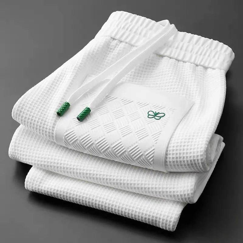 Comfortable white unisex relaxed fit pants, perfect for casual everyday style & downtime fashion. Easy care.