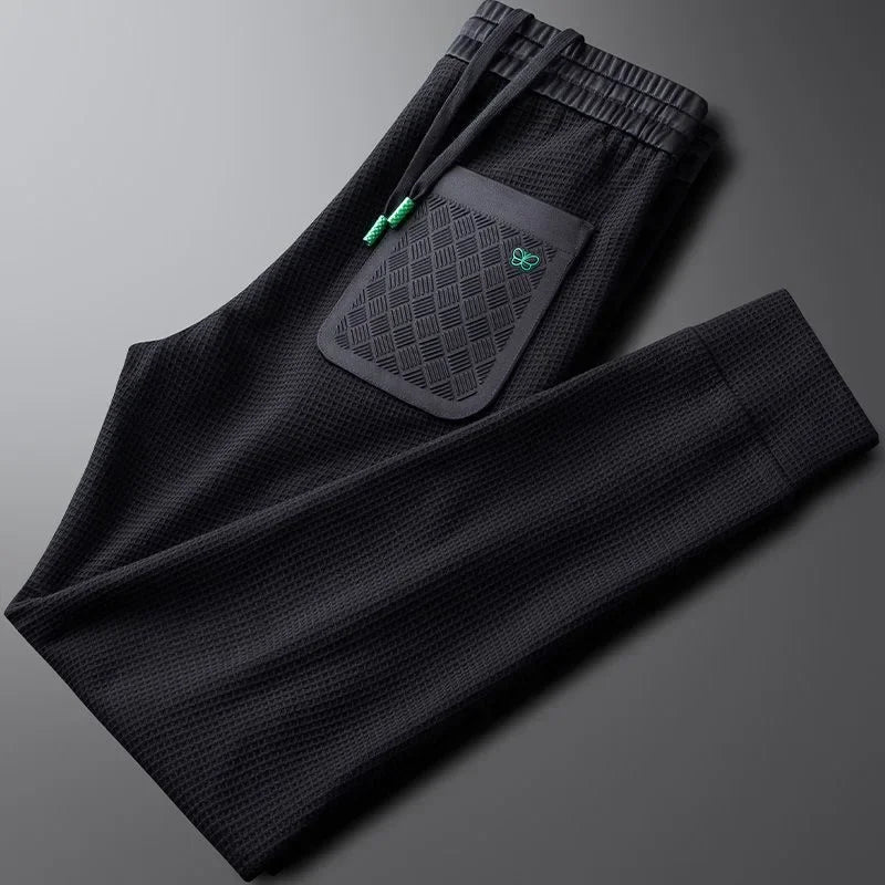 White unisex everyday relaxed fit pants for ultimate comfort, perfect for casual wear and downtime fashion.