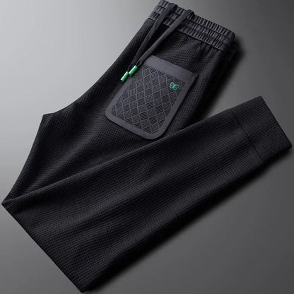 White unisex everyday relaxed fit pants for ultimate comfort, perfect for casual wear and downtime fashion.