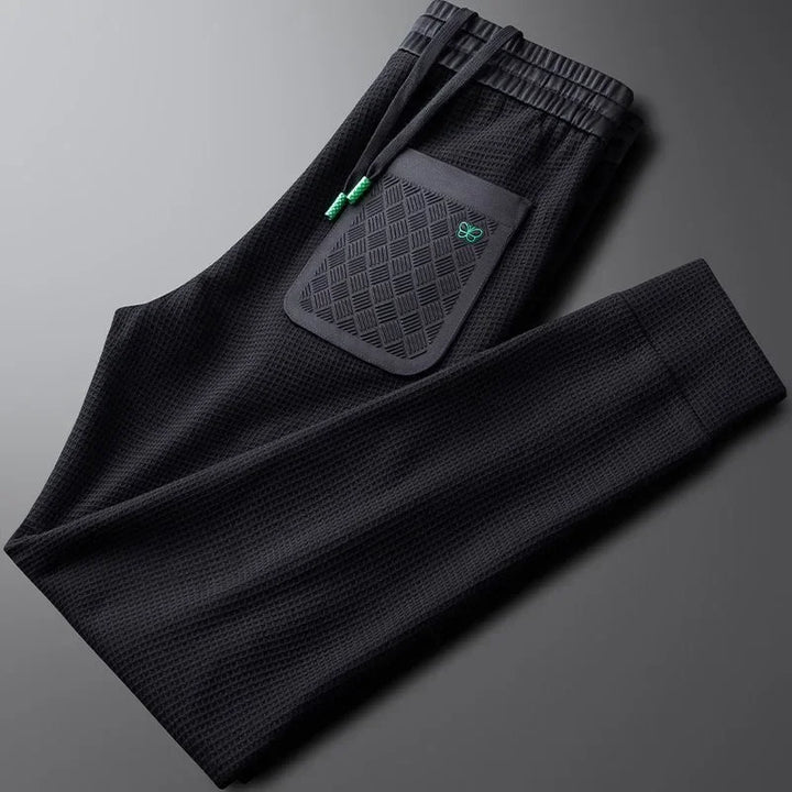 White unisex everyday relaxed fit pants for ultimate comfort, perfect for casual wear and downtime fashion.