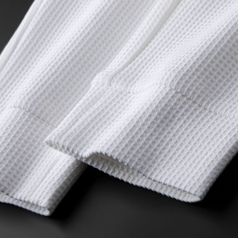 Modern fit unisex relaxed pants, available in white, ideal for comfortable everyday casual wear & loungewear.