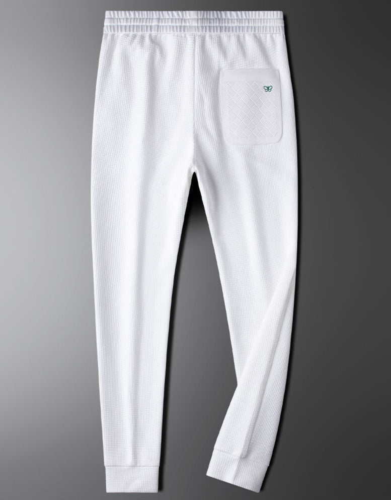 Black unisex relaxed fit pants, comfortable and versatile for casual wear and everyday style. Easy care.