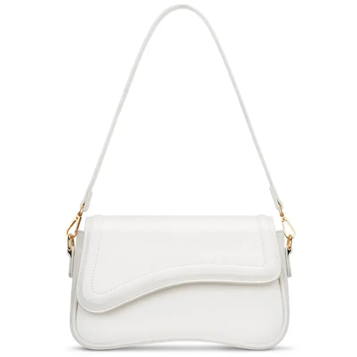 Ravello curved flap shoulder bag for women, made with soft vegan leather, an everyday sophisticated accessory.