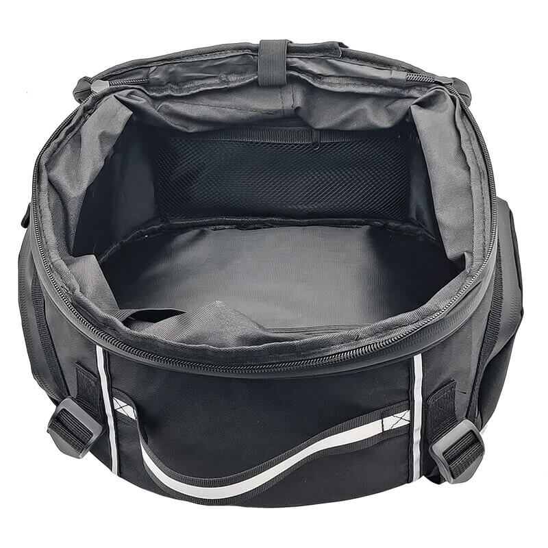 Durable black water-resistant motorcycle travel bag. Multi-compartment luggage for carrying rider gear.