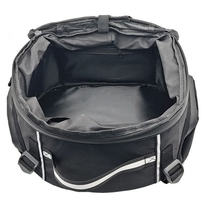 Durable black water-resistant motorcycle travel bag. Multi-compartment luggage for carrying rider gear.