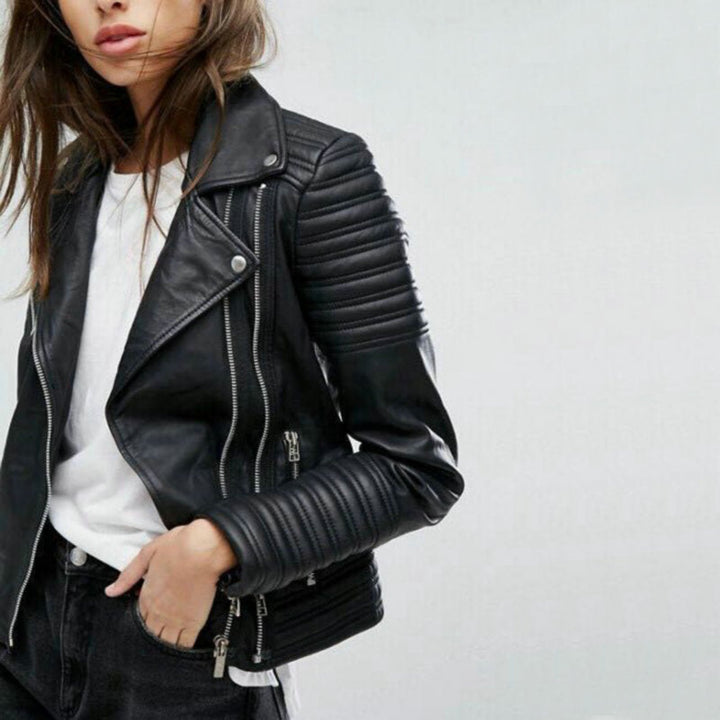 Women's black faux leather biker jacket with asymmetrical zipper details. Edgy and chic fall/spring outerwear.